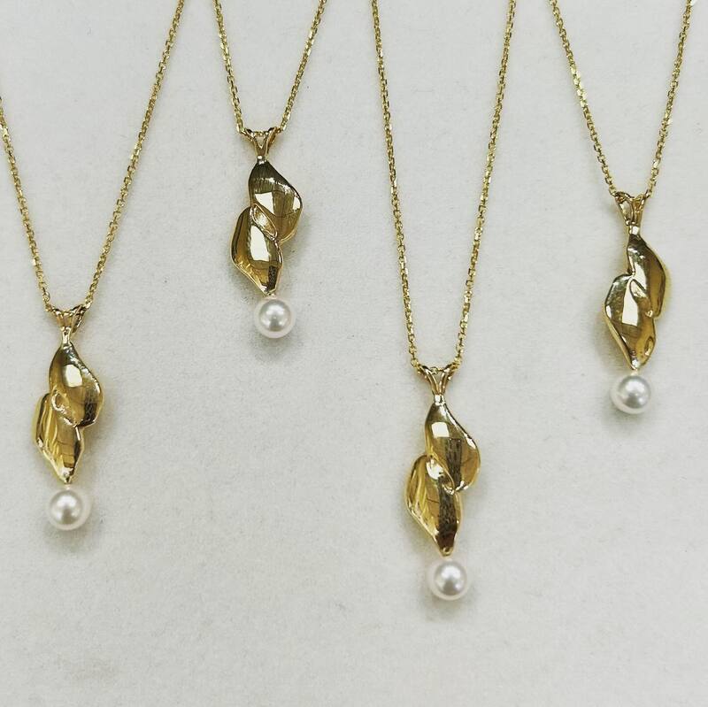 Yellow gold pendants with pearls custom created from a wedding band